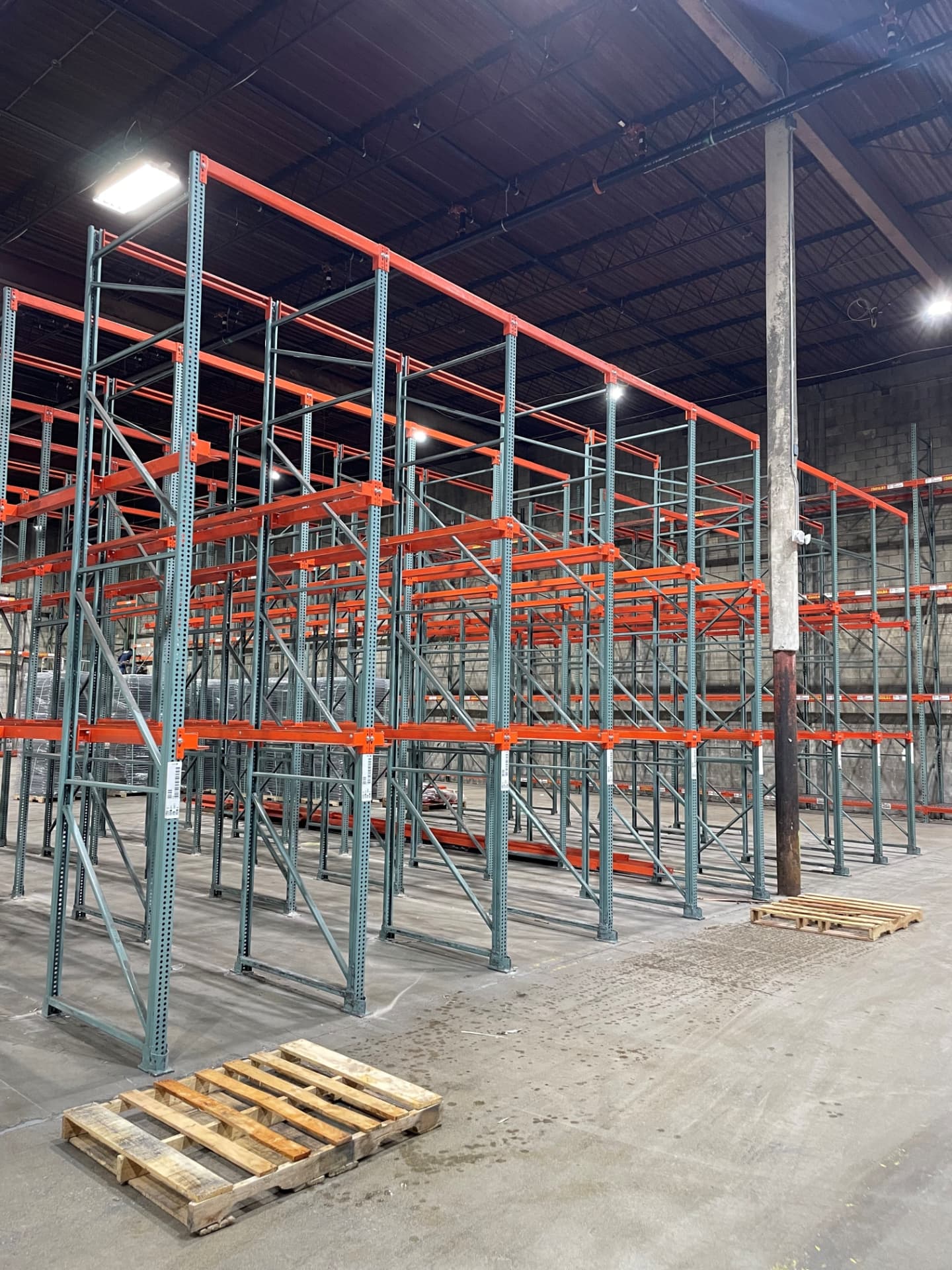 Drive-in pallet rack bays installed in a warehouse